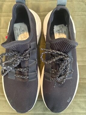 On Running Women’s Knit Lace-Up Sneakers in Black and White